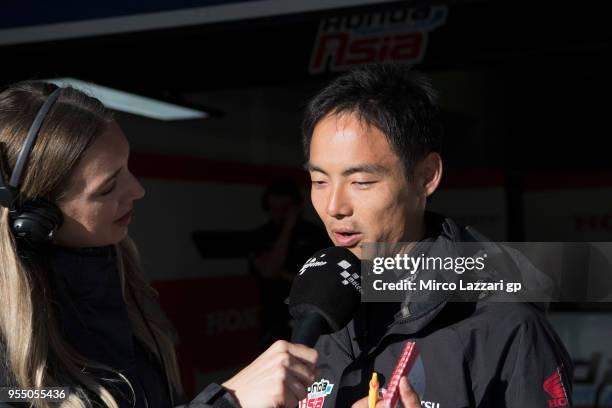 Hiroshi Aoyama of Japan speaks with journalist in pit during the qualifying practice during the MotoGp of Spain - Qualifying at Circuito de Jerez on...