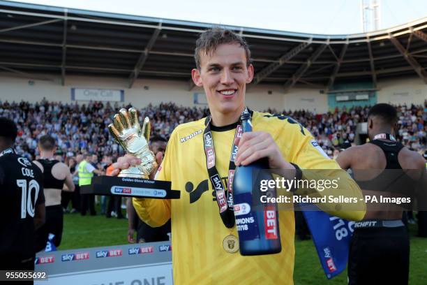 Wigan's Richard Christian Walton celebrates after Wigan win the sky Bet League One league at at the Keepmoat Stadium, Doncaster.