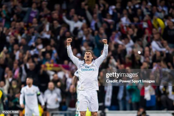 Cristiano Ronaldo of Real Madrid celebrates at the full time during the UEFA Champions League Semi Final Second Leg match between Real Madrid and...
