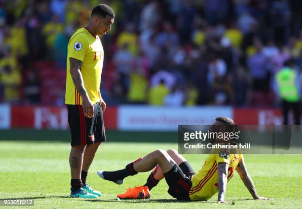 Troy Deeney of Watford and Jose Holebas of Watford during the Premier League match between Watford and Newcastle United at Vicarage Road on May 5,...