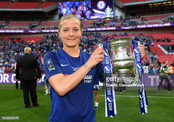 Katie Chapman celebrates with the trophy afte the SSE Women's FA Cup Final match between Arsenal Women and Chelsea Ladies at Wembley Stadium on May...