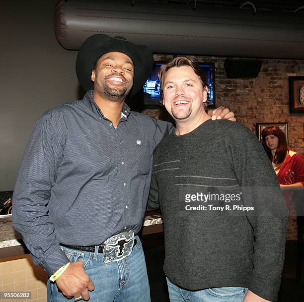 Cowboy Troy and Storme Warren at The Bashing Guitars at the Hard Rock Cafe Nashville grand re-opening and Guitar Smash on December 30, 2009 in...