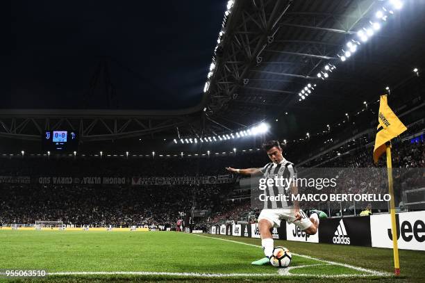 Juventus' forward Paulo Dybala from Argentina kicks a corner shoot during the Italian Serie A football match between Juventus and Bologna on May 5,...