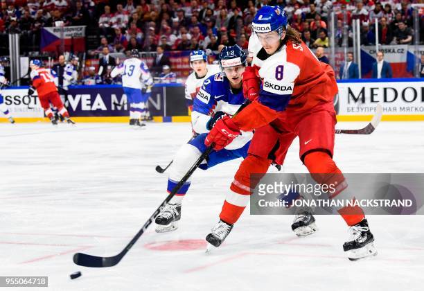 Czech Republic's Libor Sulak vies with Slovakia's David Bondra during the group A match Czech Republic vs Slovakia of the 2018 IIHF Ice Hockey World...