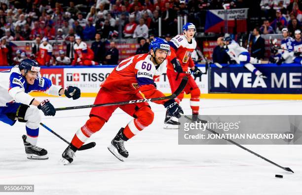 Czech Republic's Michal Moravcik vies with Slovakia's Marek Daloga during the group A match Czech Republic vs Slovakia of the 2018 IIHF Ice Hockey...