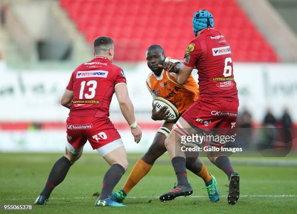 Oupa Mohoje of Cheetahs takes on Tadhg Beirne of Scarlets and Scott Williams of Scarlets during the Guinness Pro14 match between Scarlets and Toyota...