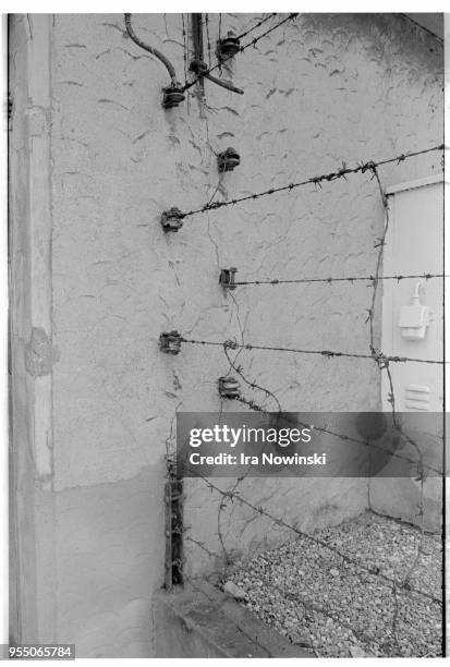 Electric fencing at buchenwald, Electrical current flowed through the barbed wire fences around the Buchenwald concentration camp. Location: Near...