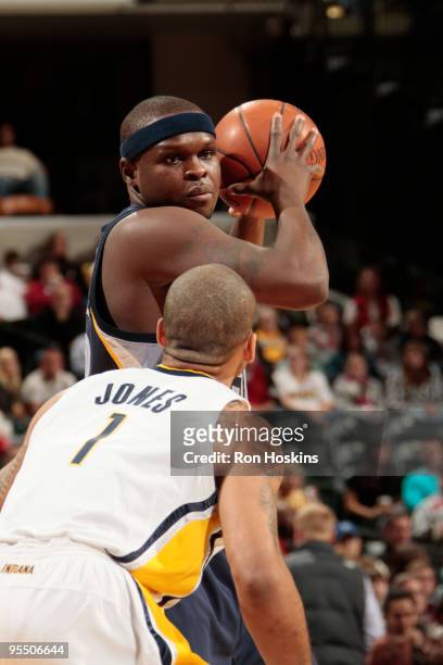 Zach Randolph of the Memphis Grizzlies looks to score on Dahntay Jones of the Indiana Pacers at Conseco Fieldhouse on December 30, 2009 in...