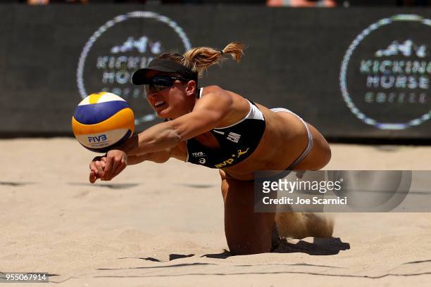 Heather Bansley of Canada dives for the ball during the match against Brooke Sweat and Lauren Fendrick of USA at the Huntington Beach Open on May 5,...