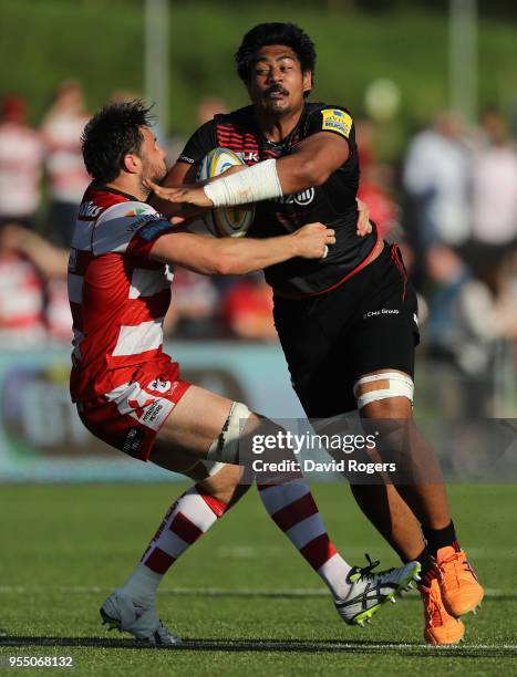 Will Skelton of Saracens is held by Jeremy Thrush during the Aviva Premiership match between Saracens and Gloucester Rugby at Allianz Park on May 5,...