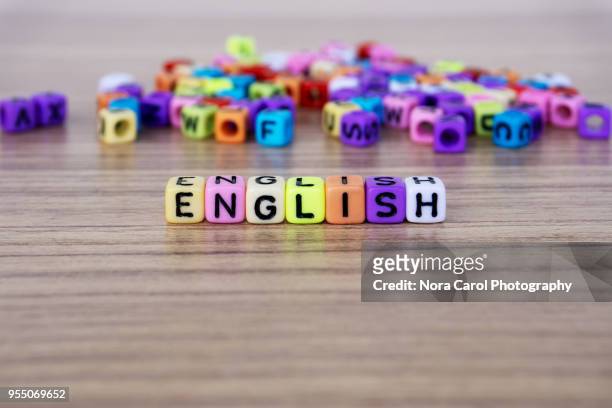 english word and alphabet letter beads - england photos et images de collection