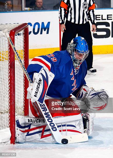 Goaltender Chad Johnson of the New York Rangers protects the net against the Philadelphia Flyers on December 30, 2009 at Madison Square Garden in New...
