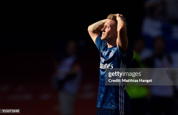 Lewis Holtby of Hamburg shows his disappointment during the Bundesliga match between Eintracht Frankfurt and Hamburger SV at Commerzbank-Arena on May...