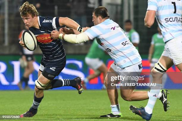 Agen's French flanker Leo Ghirard vies with Racing 92's Georgian prop Vasil Kakovin during the French Top 14 rugby union match between Racing 92 and...