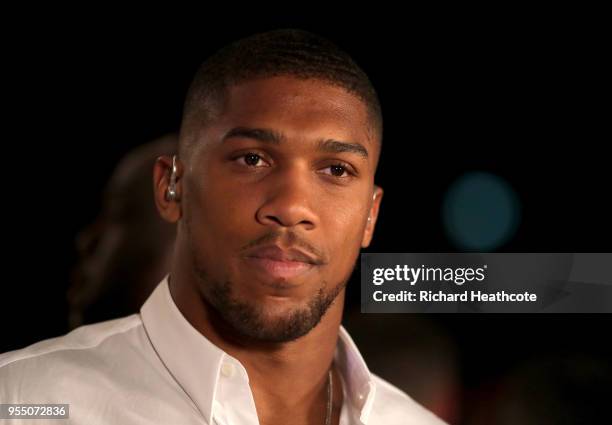 Anthony Joshua looks on from ringside during the Commonwealth Heavyweight Title fight between Lenroy Thomas and Joe Joyce at The O2 Arena on May 5,...