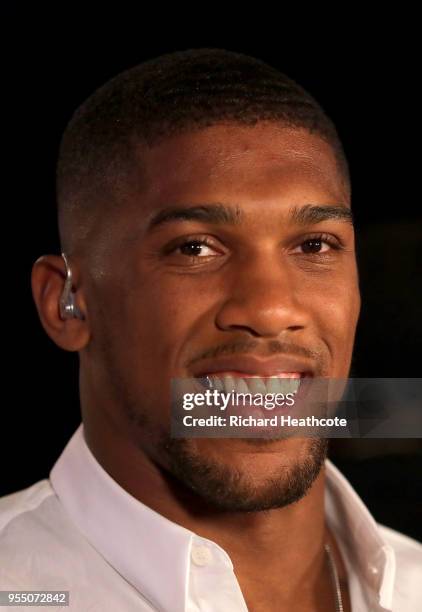 Anthony Joshua looks on from ringside during the Commonwealth Heavyweight Title fight between Lenroy Thomas and Joe Joyce at The O2 Arena on May 5,...