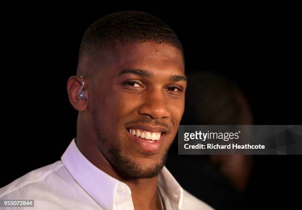 Anthony Joshua looks on from ringside during the Commonwealth Heavyweight Title fight between Lenroy Thomas and Joe Joyce at The O2 Arena on May 5,...
