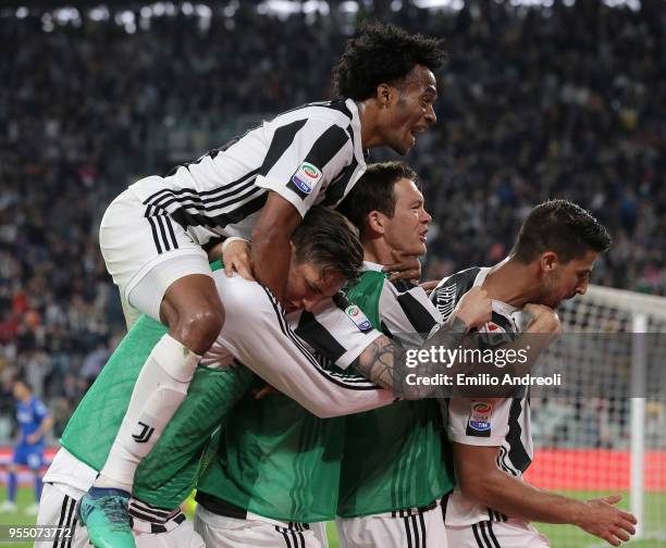 Sami Khedira of Juventus FC celebrates his goal with his team-mates during the serie A match between Juventus and Bologna FC at Allianz Stadium on...