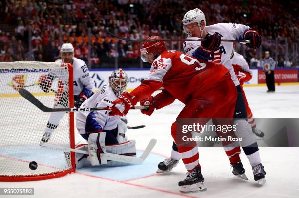 Peter Regin of Denmark and Connor Murphy of United States battle for the puck during the 2018 IIHF Ice Hockey World Championship group stage game...