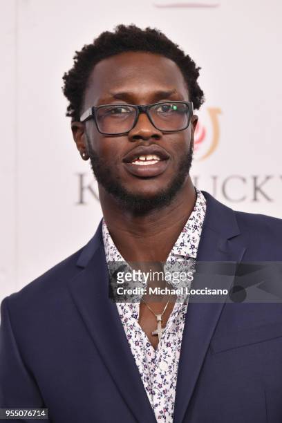 Professional basketball player for the Charlotte Hornets Mangok Mathiang attends Kentucky Derby 144 on May 5, 2018 in Louisville, Kentucky.