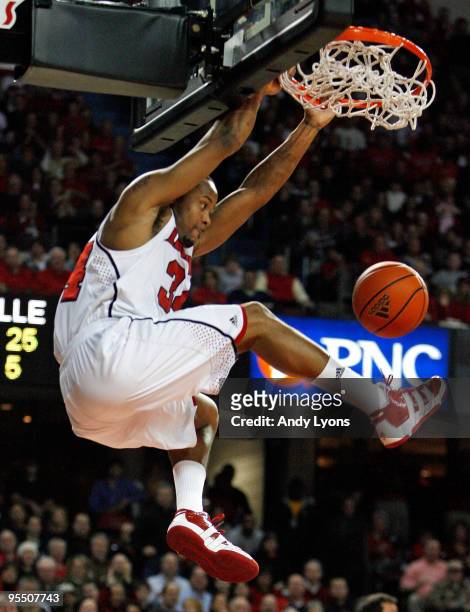 Jerry Smith of the Louisville Cardinals dunks the ball during the Big East Conference game against the South Florida Bulls at Freedom Hall on...