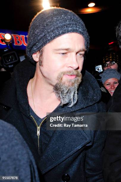 Actor Brad Pitt leaves Dave & Busters Times Square Restaurant on December 30, 2009 in New York City.