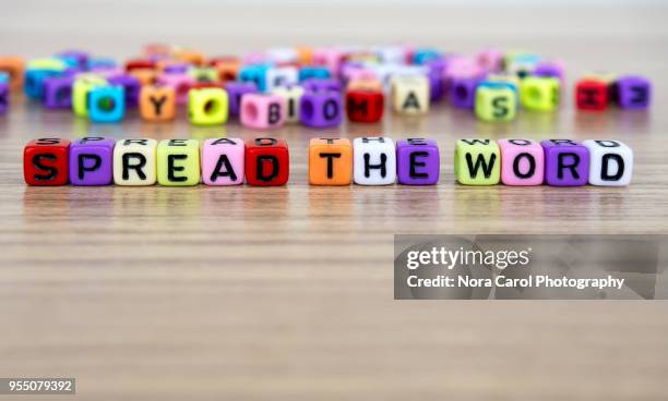 spread the word and alphabet letter beads - journalist icon stock pictures, royalty-free photos & images