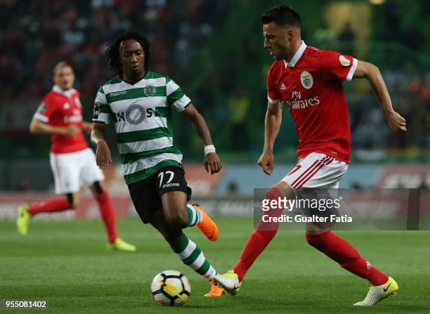 Benfica midfielder Andreas Samaris from Greece with Sporting CP forward Gelson Martins from Portugal in action during the Primeira Liga match between...