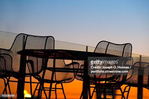 deck chair sunset - joseph o. holmes stock pictures, royalty-free photos & images