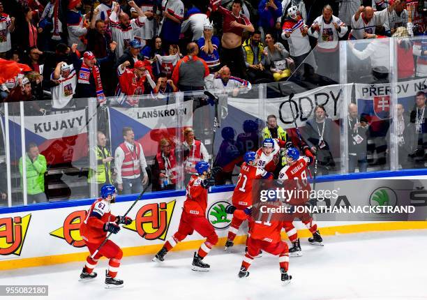 Czech Republic's Martin Necas is congratulated by teamates after scoring the equaliser goal seconds before the end of the 2018 IIHF Men's Ice Hockey...