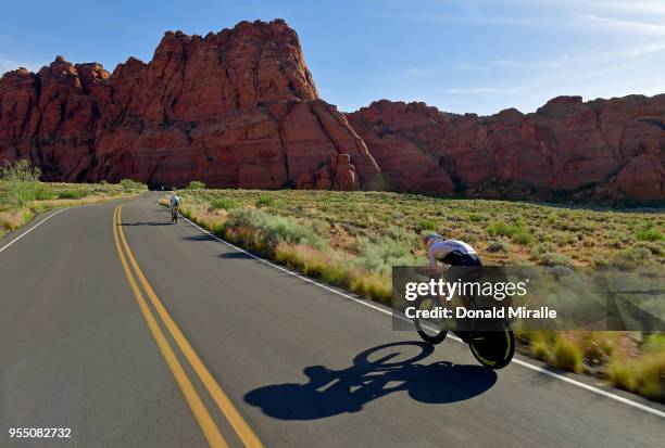 Sebastien Kienle of Germany chases Lionel Sanders of Canada on the bike during the IRONMAN 70.3 St George Utah on May 5, 2018 in St George, Utah.