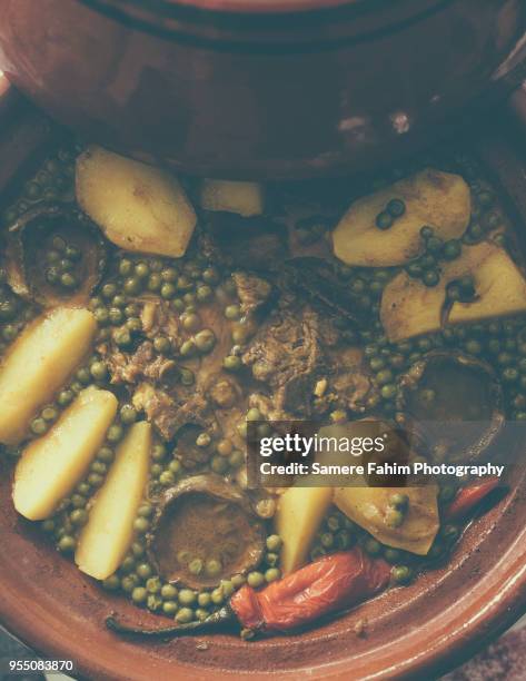 tajine of artichokes and peas with lamb meat - ground beef stew stock pictures, royalty-free photos & images