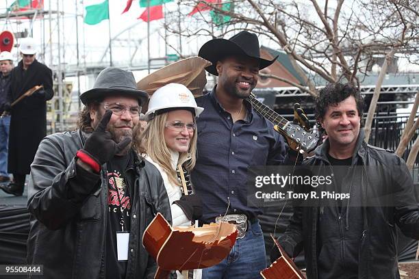 Kenny Olson, Cowboy Troy and guests are seen at The Bashing Guitars at the Hard Rock Cafe Nashville grand re-opening and Guitar Smash on December 30,...