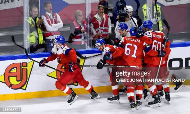 Czech Republic's Martin Necas celebrates with his teamates after scoring the equaliser goal seconds before the end of the 2018 IIHF Men's Ice Hockey...