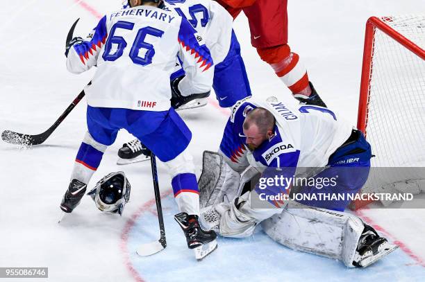 Slovakia's goalie Marek Ciliak looses his helmet during the 2018 IIHF Men's Ice Hockey World Championship match between Czech Republic and Slovakia...