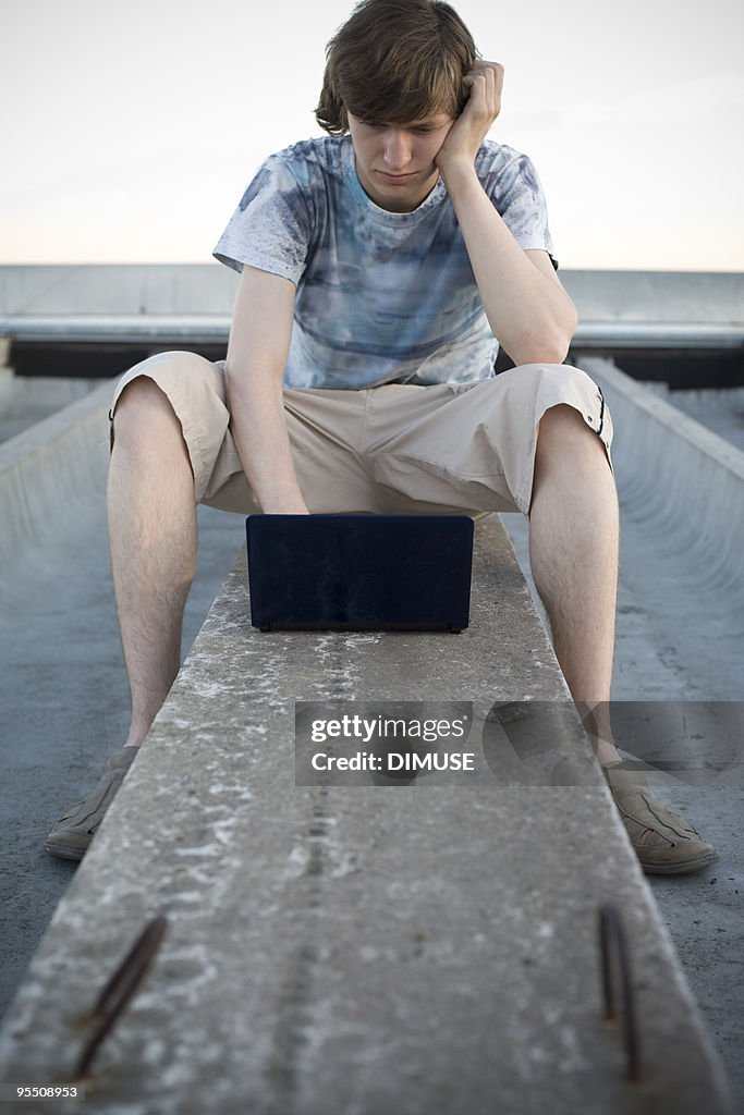 Young man with netbook