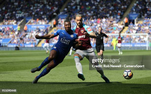 Leicester City's Wes Morgan and West Ham United's Marko Arnautovic during the Premier League match between Leicester City and West Ham United at The...