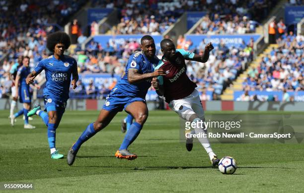 Leicester City's Wes Morgan and West Ham United's Cheikhou Kouyate during the Premier League match between Leicester City and West Ham United at The...