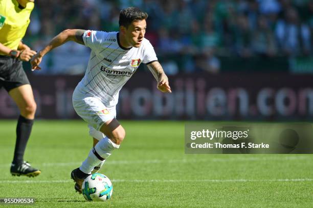 Charles Aranguiz of Leverkusen runs with the ball during the Bundesliga match between SV Werder Bremen and Bayer 04 Leverkusen at Weserstadion on May...