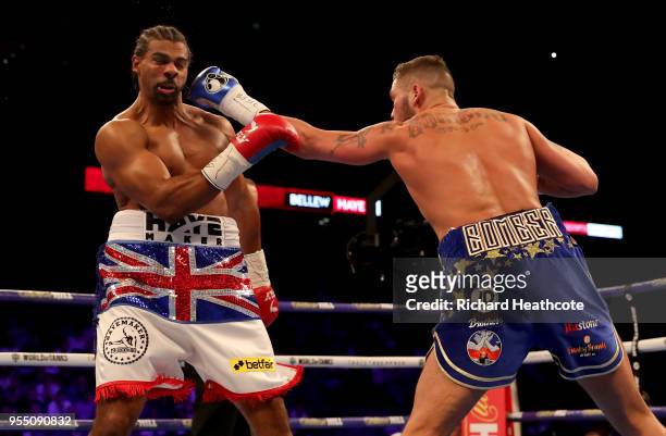 Tony Bellew punches David Haye during Heavyweight fight between Tony Bellew and David Haye at The O2 Arena on May 5, 2018 in London, England.