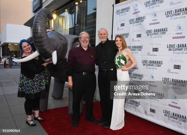 Jessie Maltin, Leonard Maltin, Michael Bell and Ashley Bell attend the Love & Bananas: An Elephant Story Los Angeles premiere at Laemmle Music Hall...