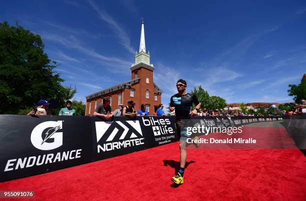 General view of age group athlete running in the finish line chute during the IRONMAN 70.3 St George Utah on May 5, 2018 in St George, Utah.