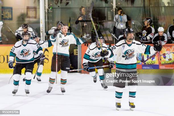 Cathay Flyers squad invades the ring after winning the Mega Ice Hockey 5s International Elite Final match between Nordic Vikings and Cathay Flyers on...