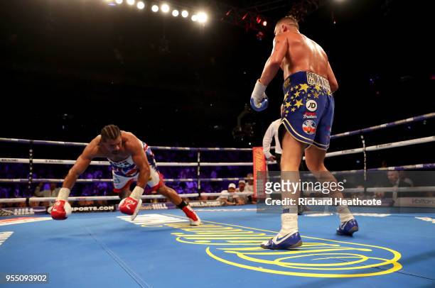 Tony Bellew knocks down David Haye during Heavyweight fight between Tony Bellew and David Haye at The O2 Arena on May 5, 2018 in London, England.