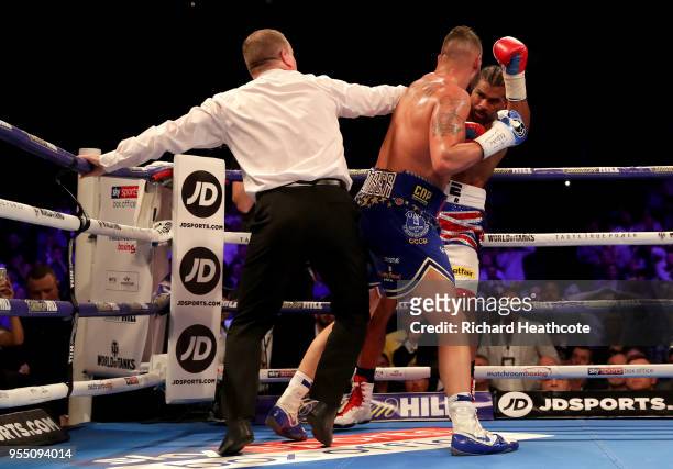 The referee stops the fight as Tony Bellew punches David Haye during Heavyweight fight between Tony Bellew and David Haye at The O2 Arena on May 5,...