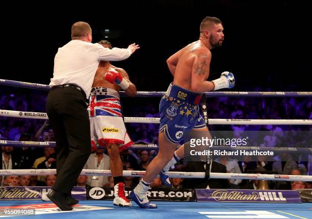 Tony Bellew celebrates victory as the referee stops the fight during Heavyweight fight between Tony Bellew and David Haye at The O2 Arena on May 5,...