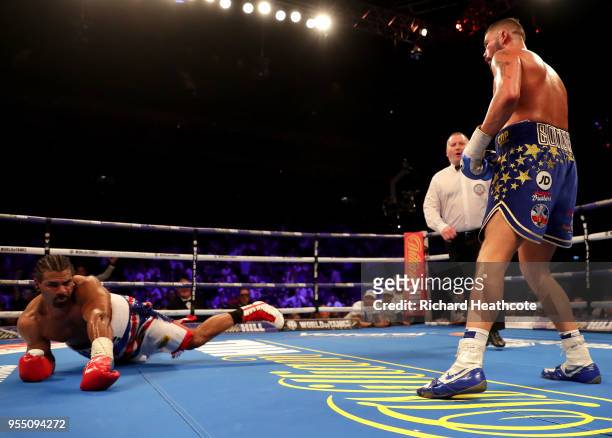 Tony Bellew knocks down David Haye during Heavyweight fight between Tony Bellew and David Haye at The O2 Arena on May 5, 2018 in London, England.