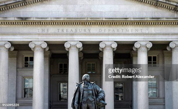 Statue of Albert Gallatin, a former U.S. Secretary of the Treasury, stands in front of The Treasury Building in Washington, D.C. The National...