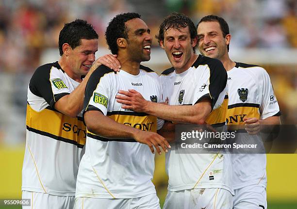 Paul Ifill of the Phoenix celebrates with team mates after scoring a goal during the round 21 A-League match between the Central Coast Mariners and...