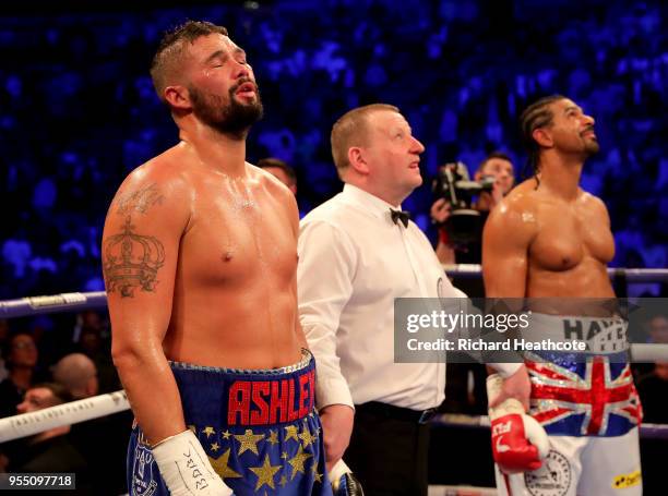 Tony Bellew waits for his hand to be raised after Heavyweight fight between Tony Bellew and David Haye at The O2 Arena on May 5, 2018 in London,...